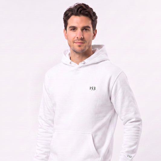 A man wearing a white pullover hoodie with a small black '153' logo on the left chest, paired with dark jeans, photographed against a clean white studio background.